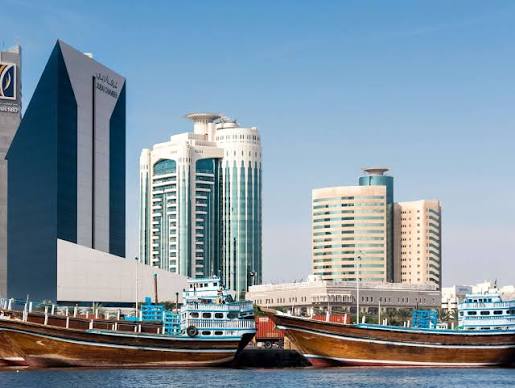 The Deira waterfront and the creek by day, two boats moored